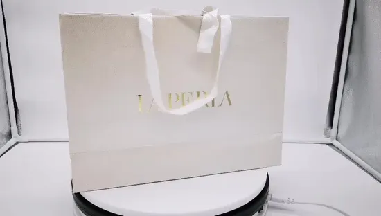 Bolsa de papel personalizada de fábrica, bolsa de papel de compras de lujo con asa